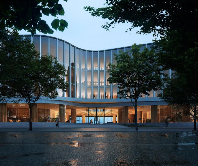A building that has trees in front.