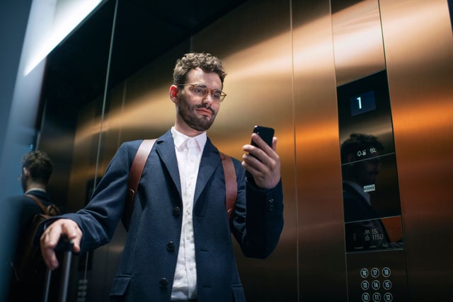 Business man in an elevator