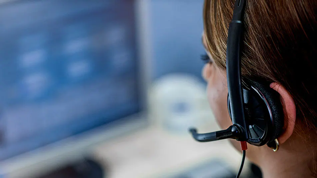 KONE support person taking a call
