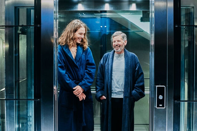 Man and woman in elevator