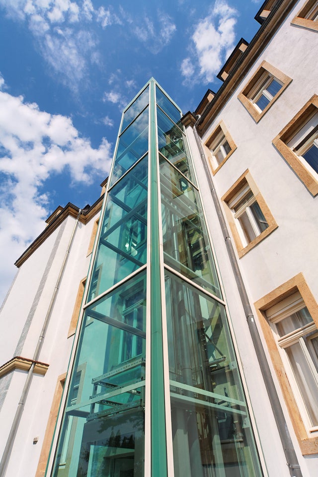 Elevator installed outside a building