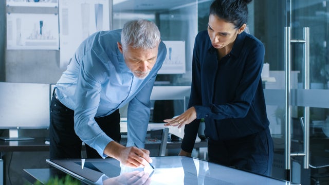 2 people checking terms